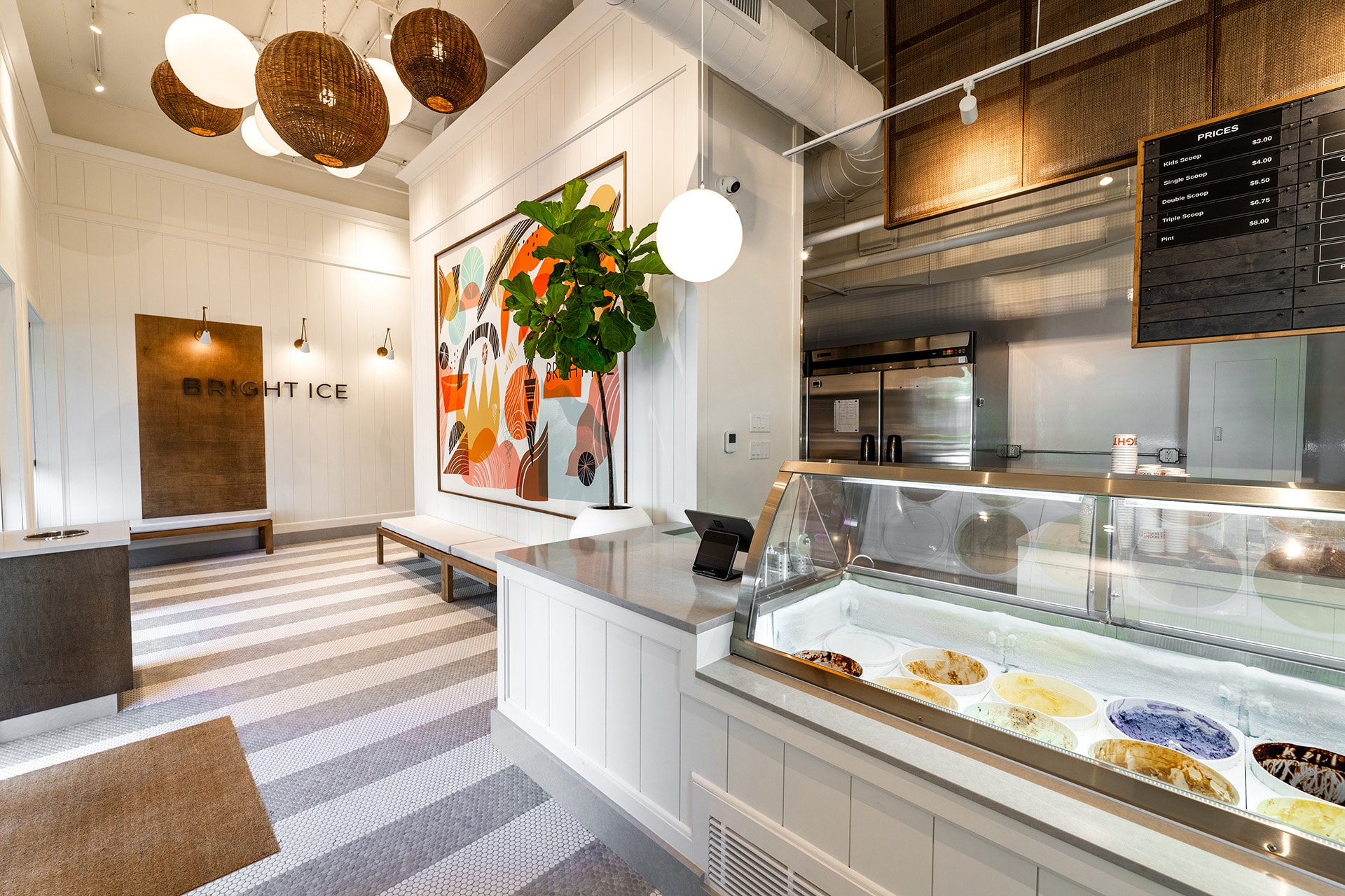 An image of the Bright Ice Scoop's bright and vibrant interior shop with its different flavors on display