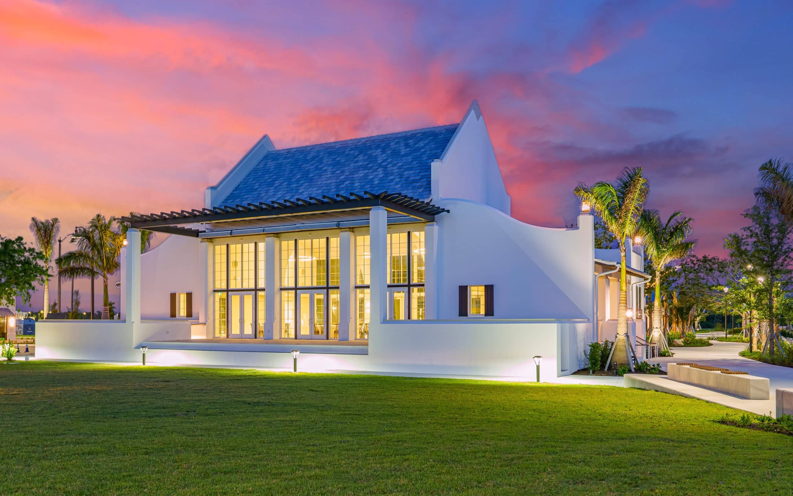 Solis Hall as durk with its lights turned on outside