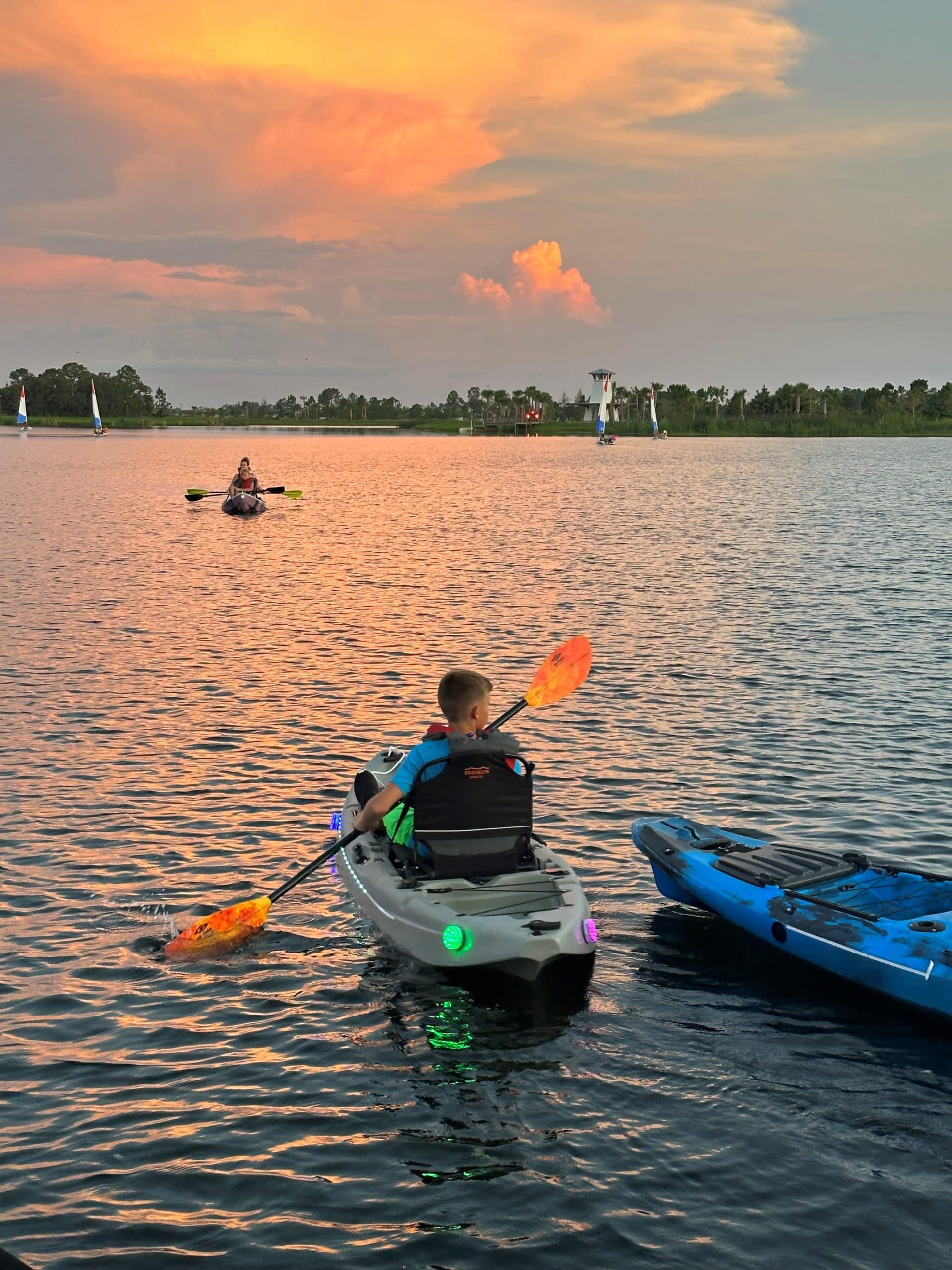 A person in a lake kayaking