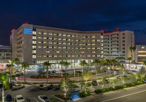 An image of the Sarasota Memorial Health hostpital building taken from a distance