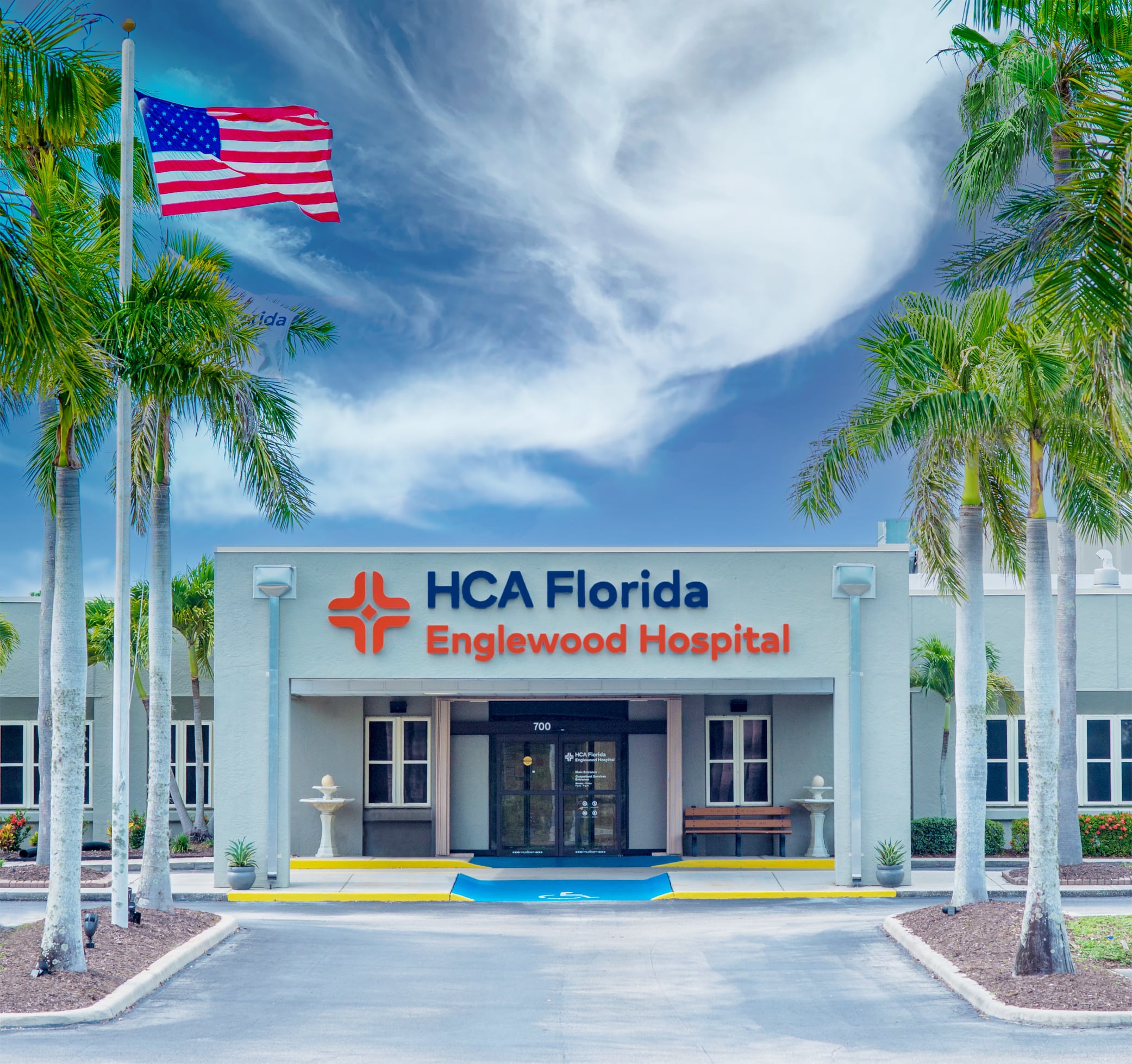 An image of the HCA Florida Englewood Hospical taken from the driveway leading to its entrance