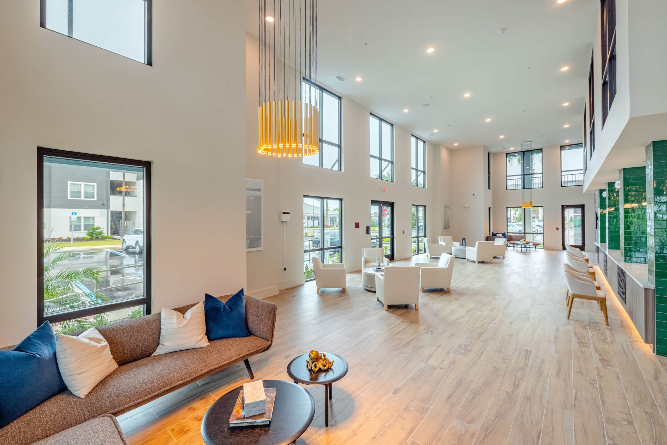 A reception seating area with couches and chairs in the background